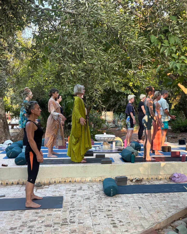 Guests gathering for yoga in the garden